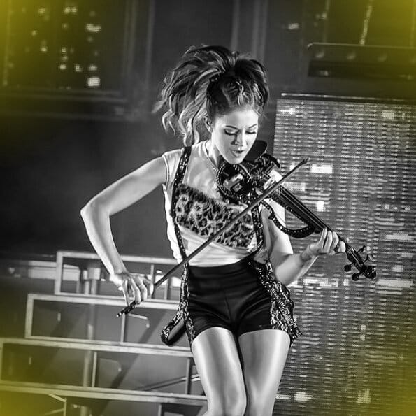 Lindsay Stirling playing violin at Good Vibes Concert