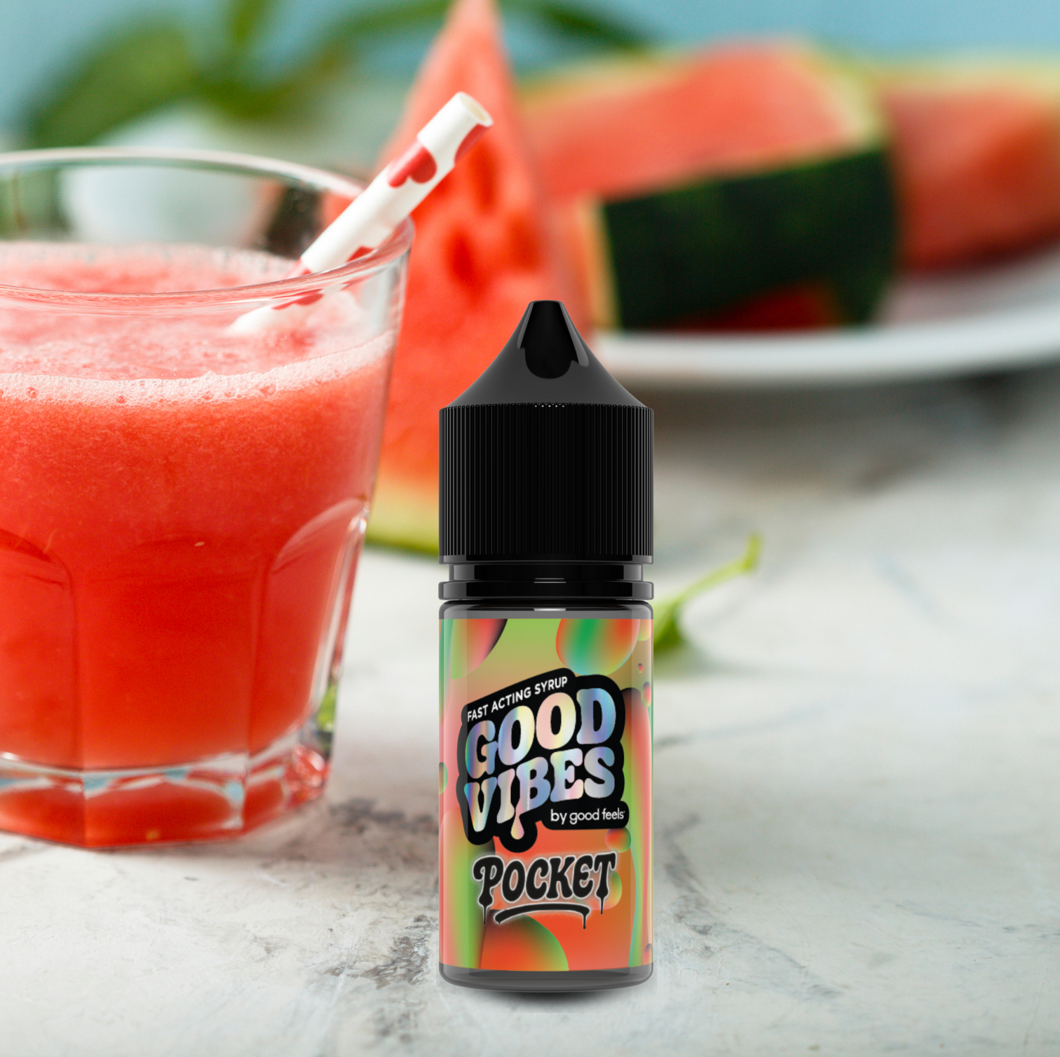 Good Vibes Pocket Watermelon Fast Acting THC Syrup on table with watermelon beverage and fruit chunks