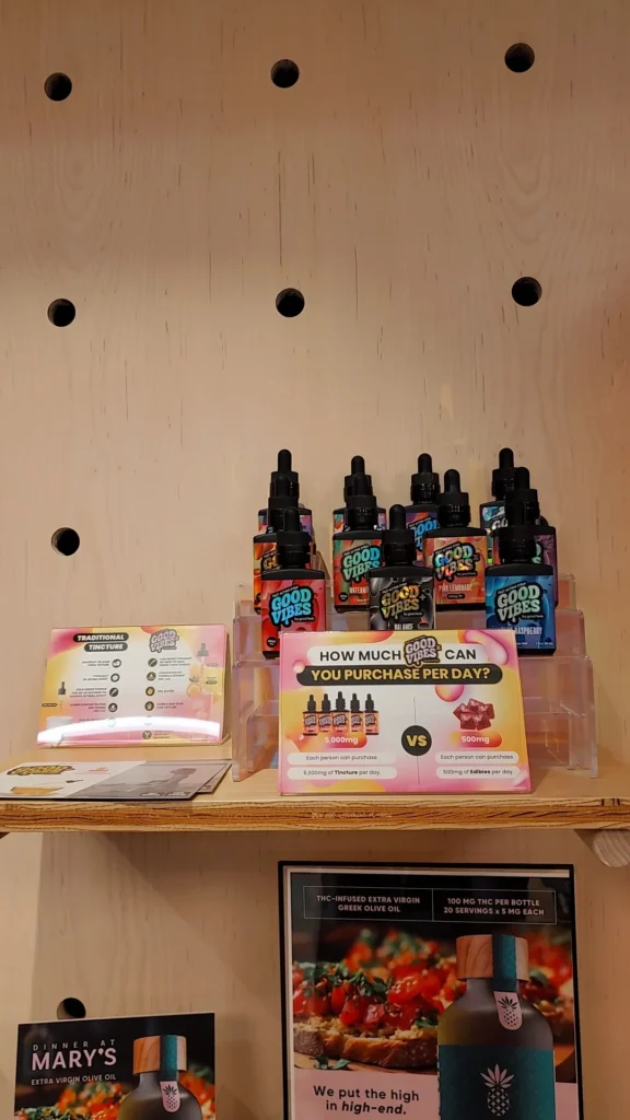 Good Vibes bottles and colorful display cards at The Goods - Somerville.