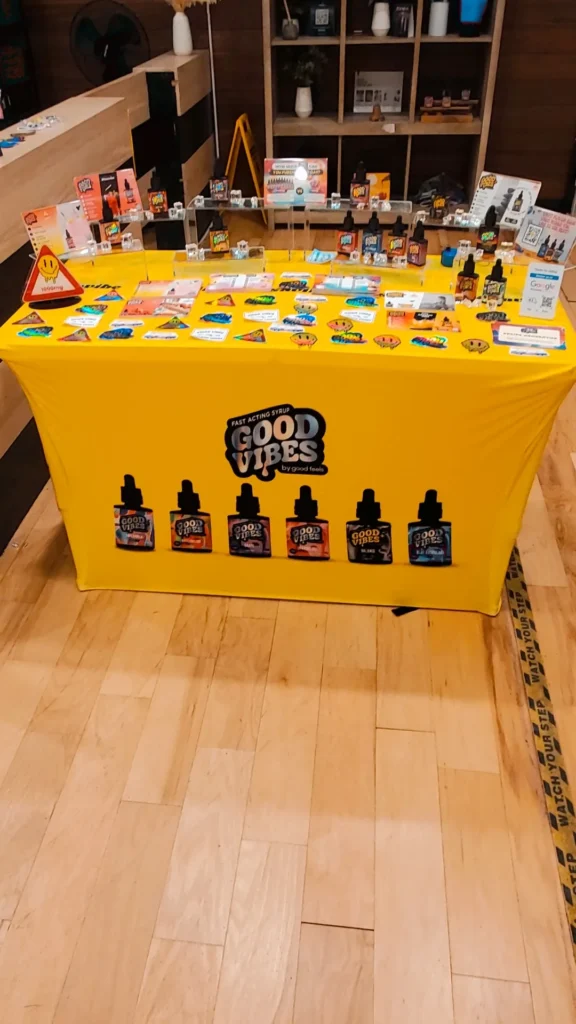 A Good Vibes display arranged across the retail counter at Sanctuary Medicinals - Woburn.