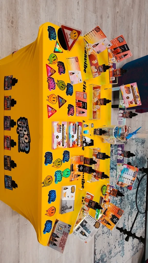 A Good Vibes sign anchoring the retail display at Redi - Natick.