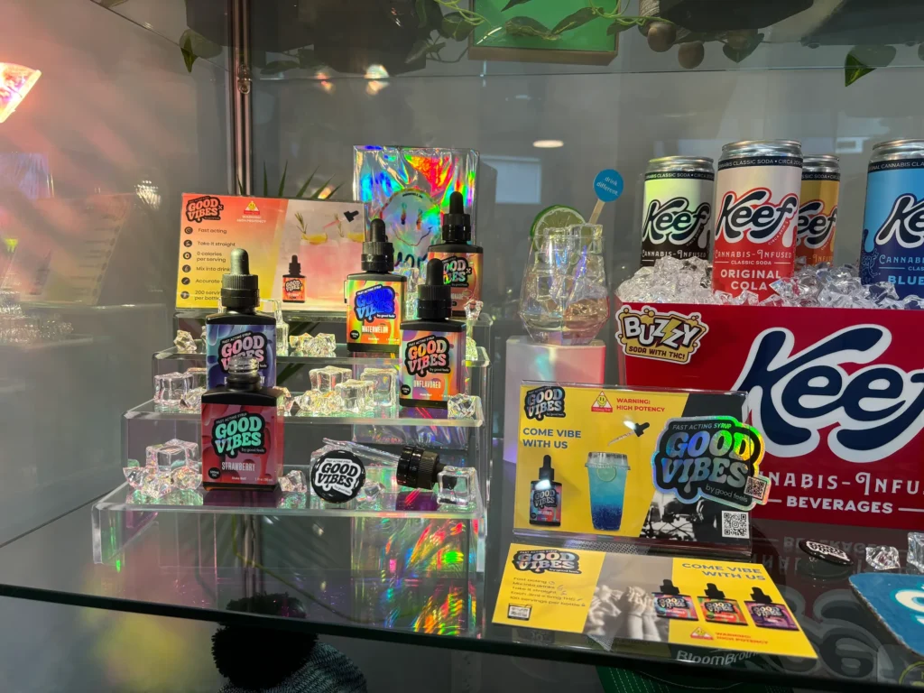 Colorful bottle and retail display featuring fast-acting syrup and Strawberry at Bloom Brothers – Pittsfield.