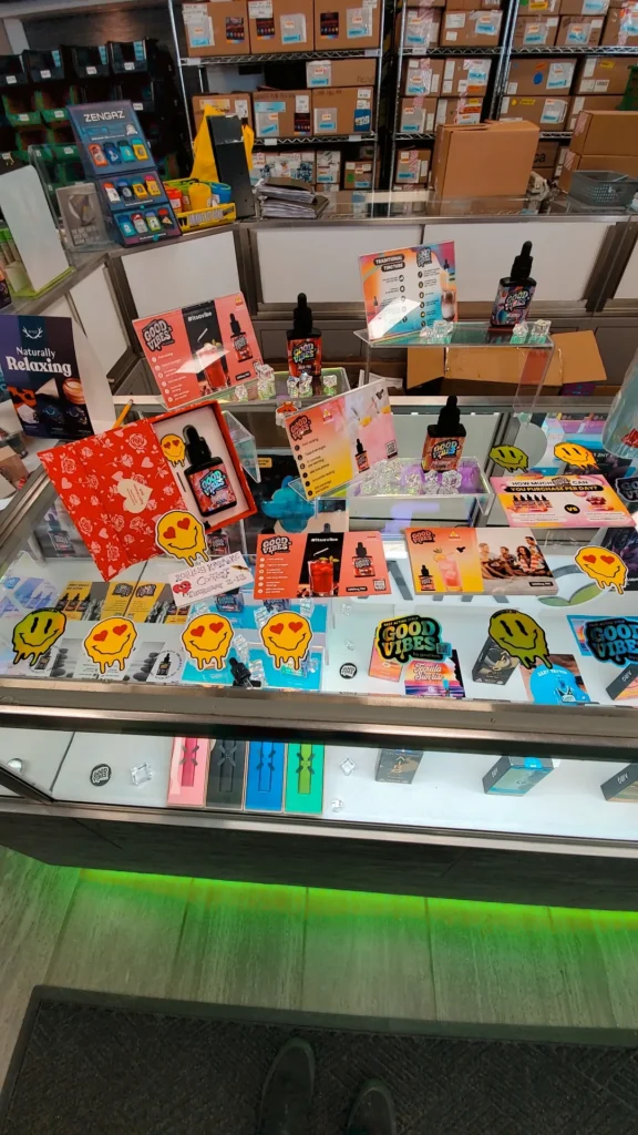 A Good Vibes display set within the shop interior at Greener Leaf - Fall River.