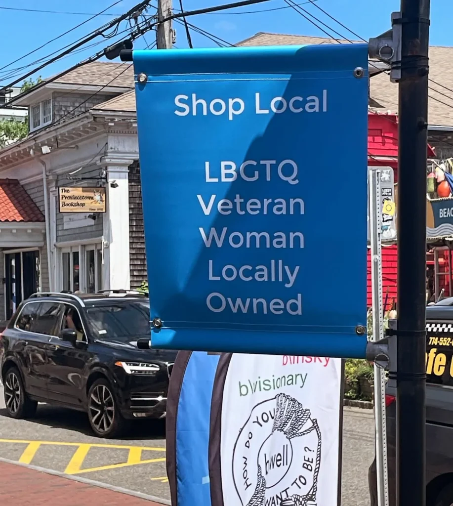 Polished branded display featuring products and signage at bwell Dispensary Provincetown.