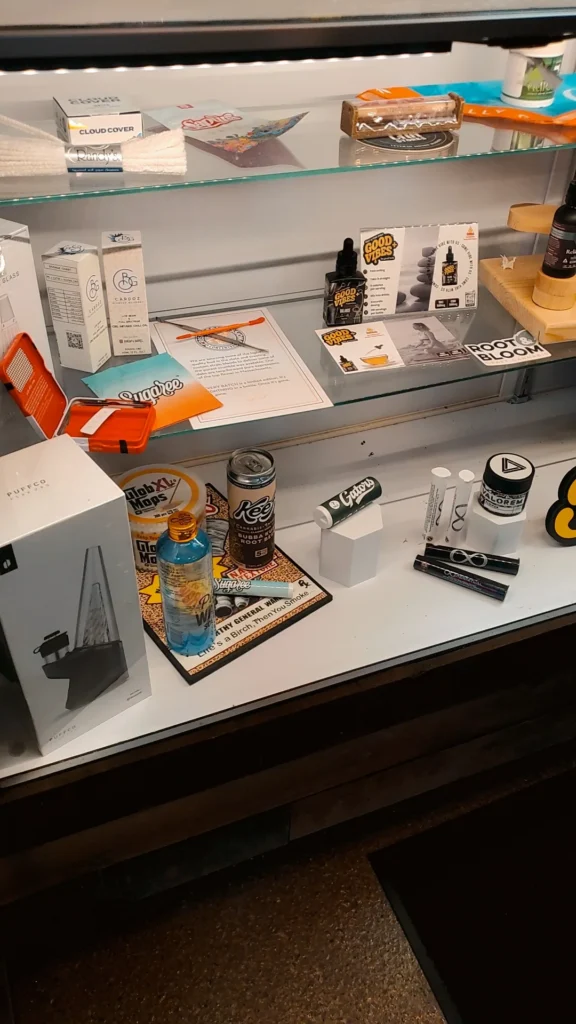 A warm-toned retail display with wood surfaces at CNA Stores - Haverhill.