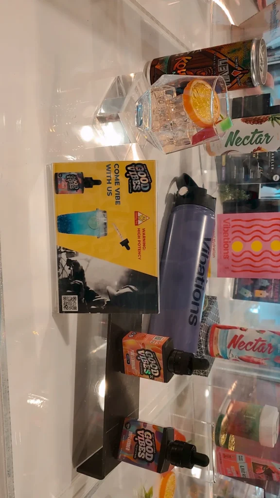Good Vibes bottles and colorful display cards at South Shore Buds - Marshfield.
