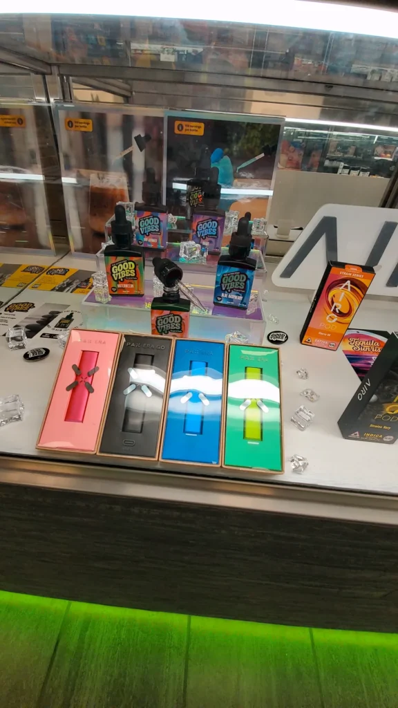 A Good Vibes sign anchoring the retail display at Greener Leaf - Fall River.