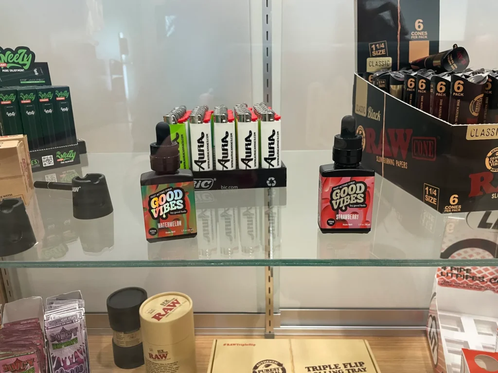 Warm bottle and retail display featuring fast-acting syrup and Watermelon at Aura – Fall River.