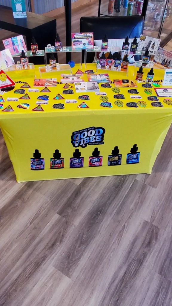 A Good Vibes display set within the shop interior at Lowell Cannabis Co..