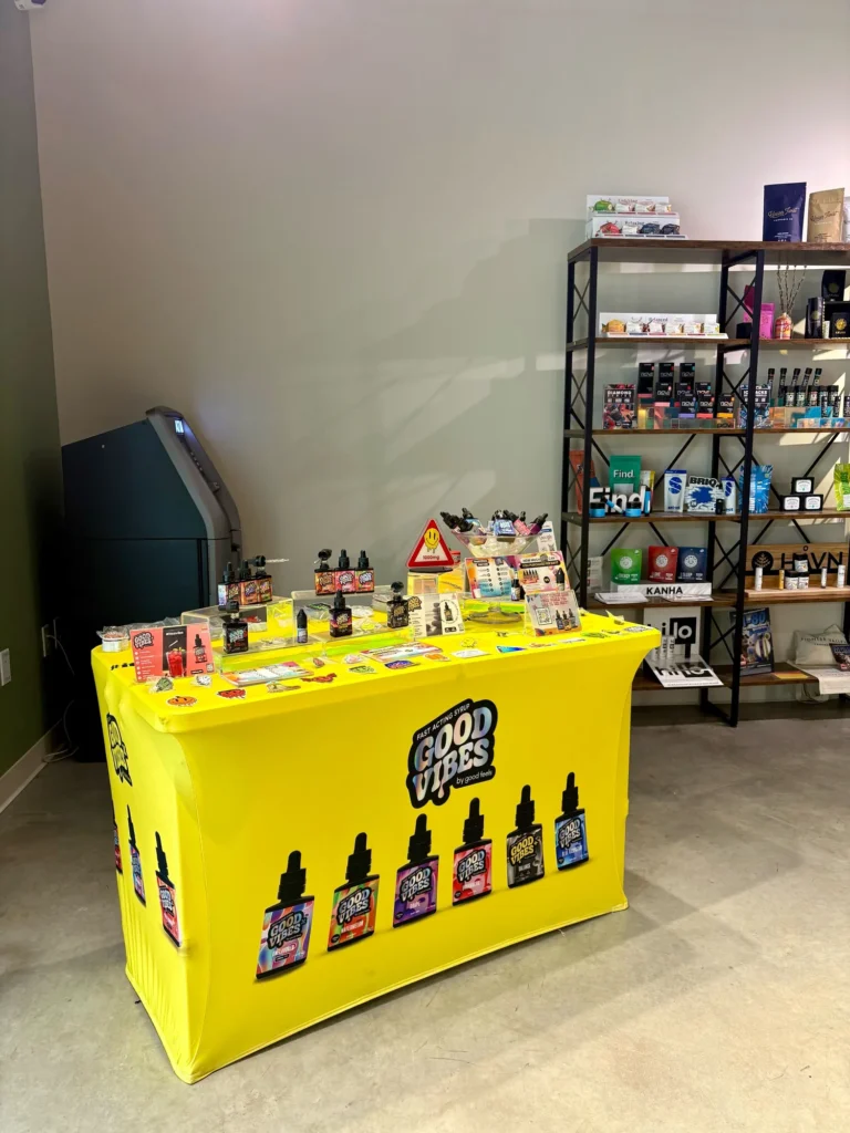 Good Vibes display with Good Vibes packaging and product information at Dutchess Cannabis – Allston.