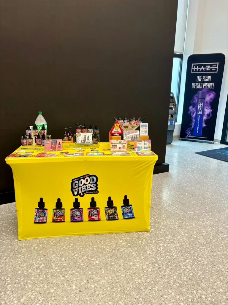 Good Vibes display with Good Vibes packaging and product information at Ayr Wellness – Watertown.