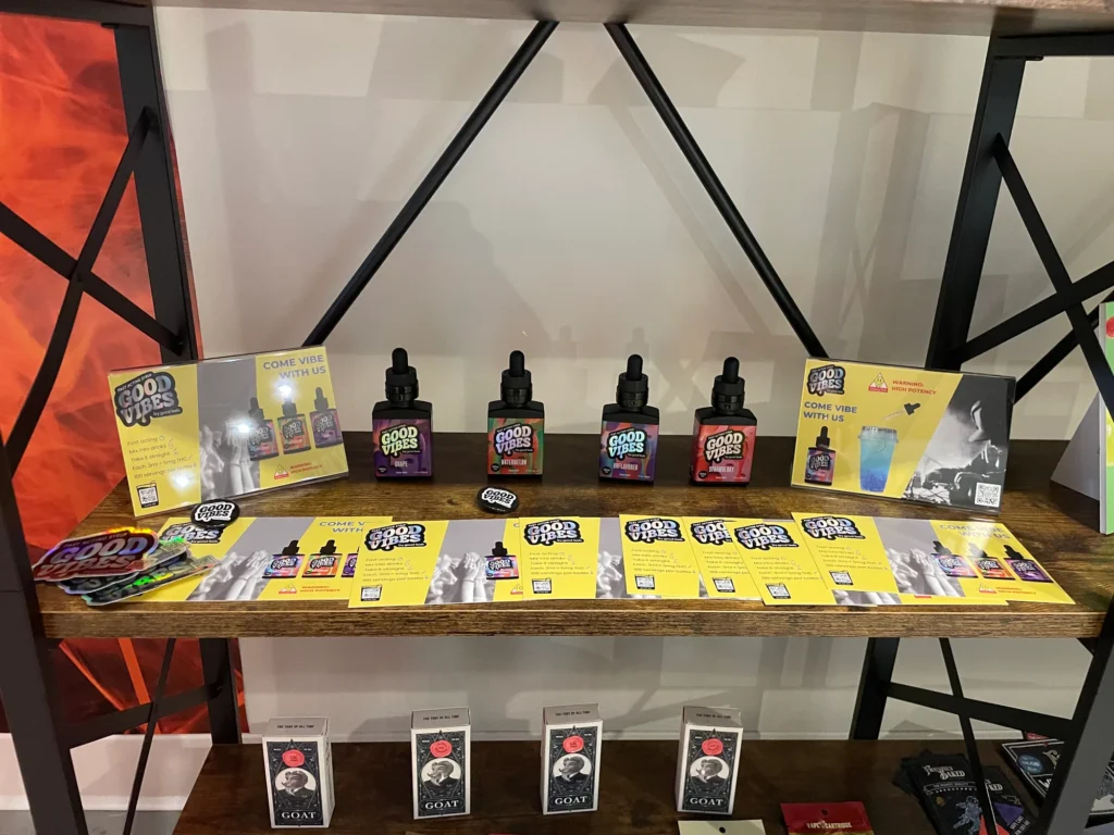 Playful bottle and retail display featuring Watermelon and Strawberry at Dutchess Cannabis – Allston.