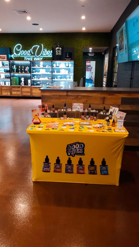 Good Vibes bottles and colorful display cards at Native Sun Wellness - South Boston.