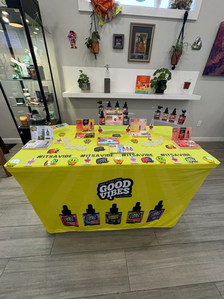 A Good Vibes sign anchoring the retail display at Bloom Brothers - Pittsfield.