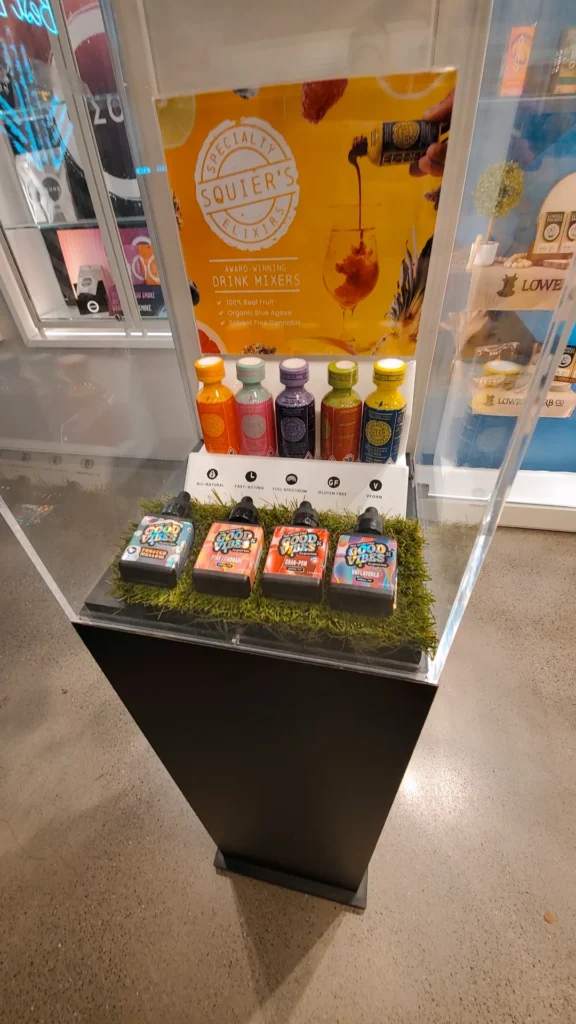 Bottles and colorful display cards at Ascend - Boston.
