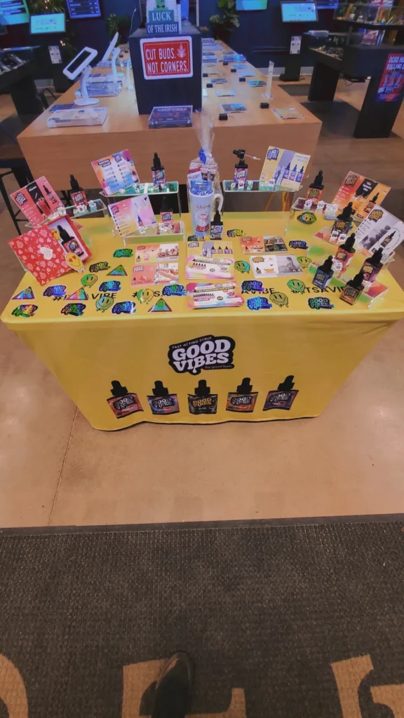 Good Vibes bottles and colorful display cards at Botera - Franklin.