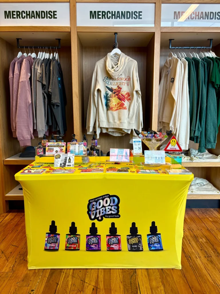 Good Vibes display with Blue Raspberry and Watermelon bottles at Rise – Dracut.
