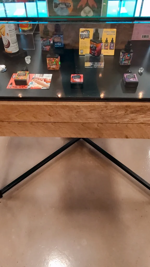 A Good Vibes sign anchoring the retail display at Native Sun Wellness - North Attleboro.