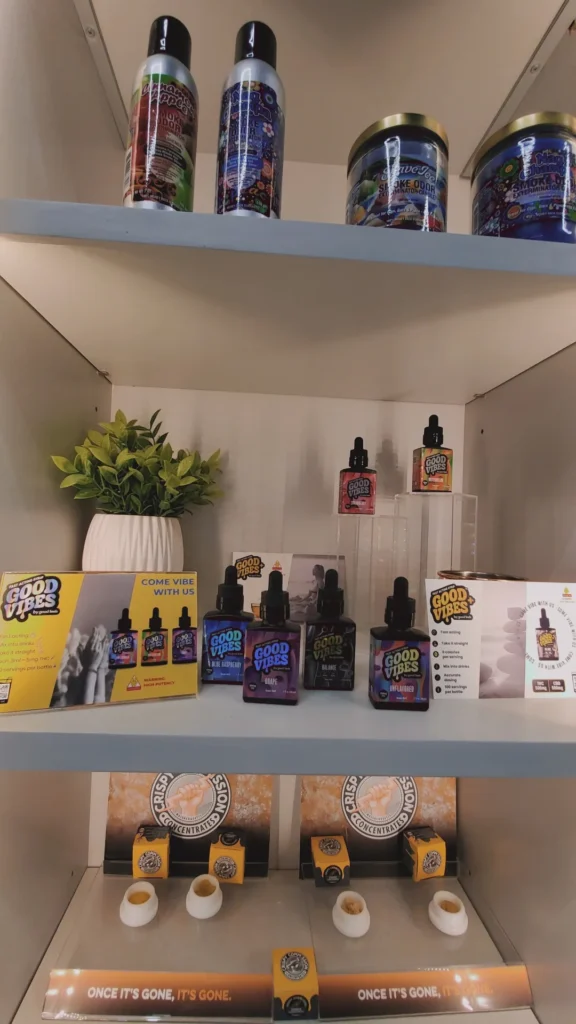 Good Vibes bottles and colorful display cards at Redi - Natick.