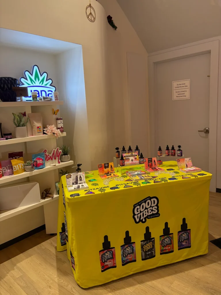 A Good Vibes sign anchoring the retail display at Calyx Berkshire - Great Barrington.