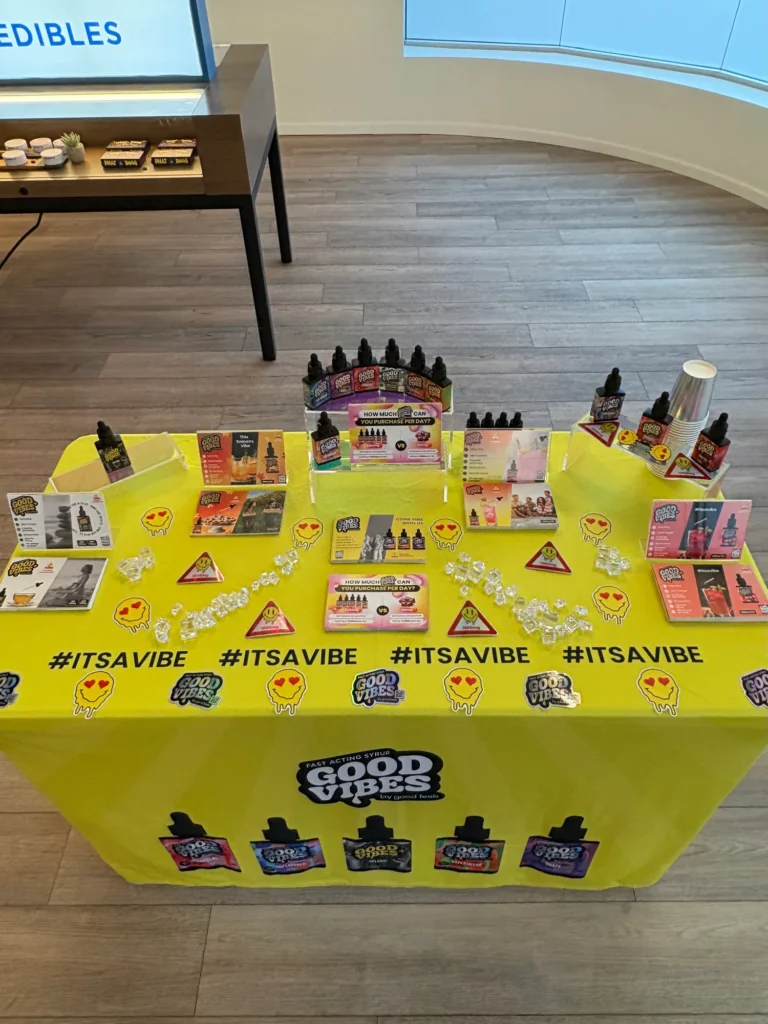 A Good Vibes sign anchoring the retail display at Ascend - Newton.