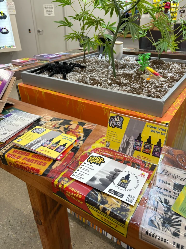 A Good Vibes sign anchoring the retail display at Budhaus - Pittsfield.