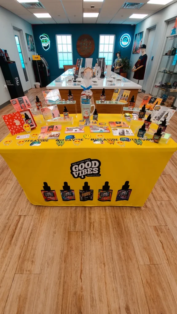 A Good Vibes sign anchoring the retail display at 1 Connection - North Dighton.