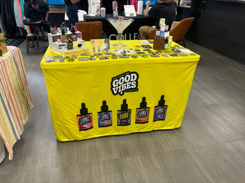 Warm branded display featuring fast-acting syrup and Watermelon at Collective Premium Cannabis – Littleton.