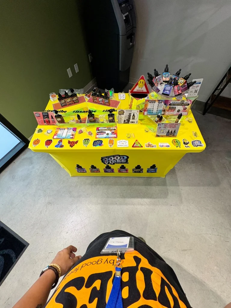 Good Vibes display with Good Vibes packaging and product information at Dutchess Cannabis – Allston.