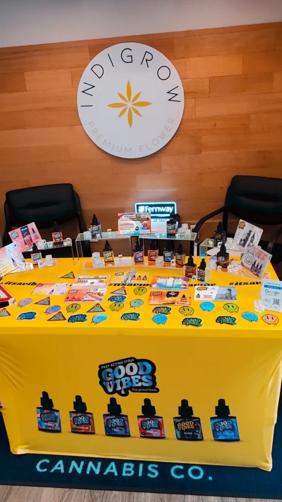 Good Vibes bottles and colorful display cards at Renew Cannabis Co (Berkley).