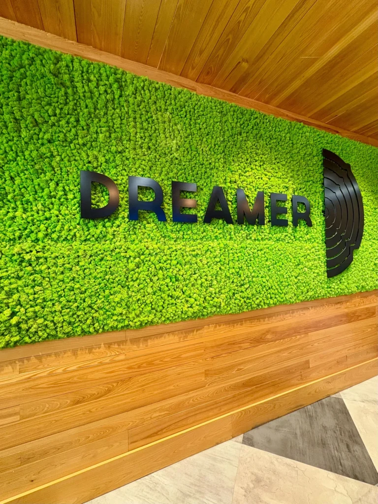 A warm-toned retail display with wood surfaces at Dreamer - Southampton.