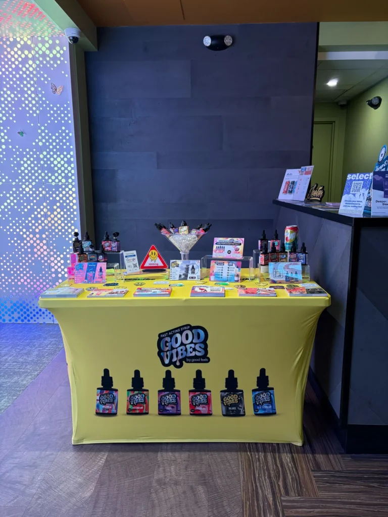 Good Vibes bottles and colorful display cards at Honey - Northampton.