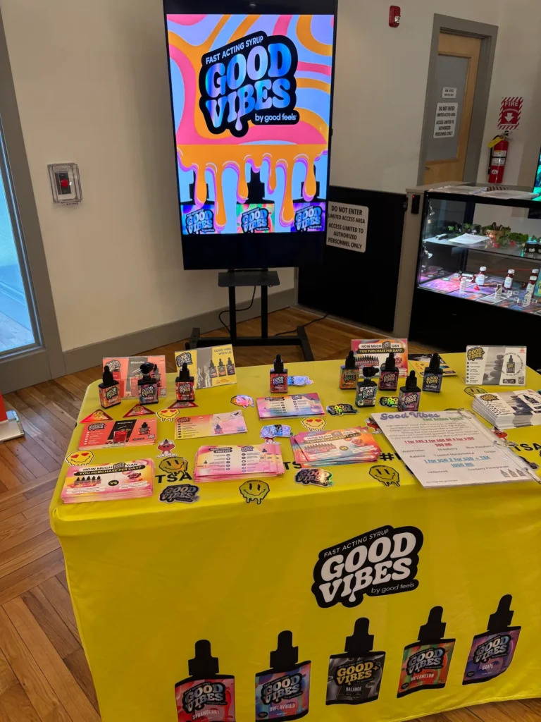 A Good Vibes sign anchoring the retail display at Green City - Attleboro.
