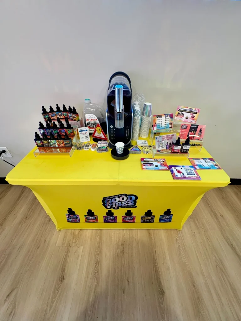 Good Vibes display with Good Vibes packaging and product information at Quincy Cannabis.
