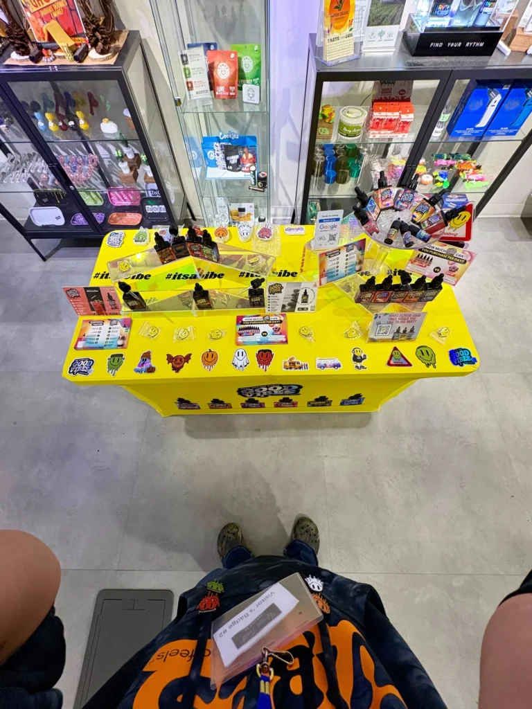 Good Vibes display with Good Vibes packaging and product information at Dutchess Cannabis – Framingham.