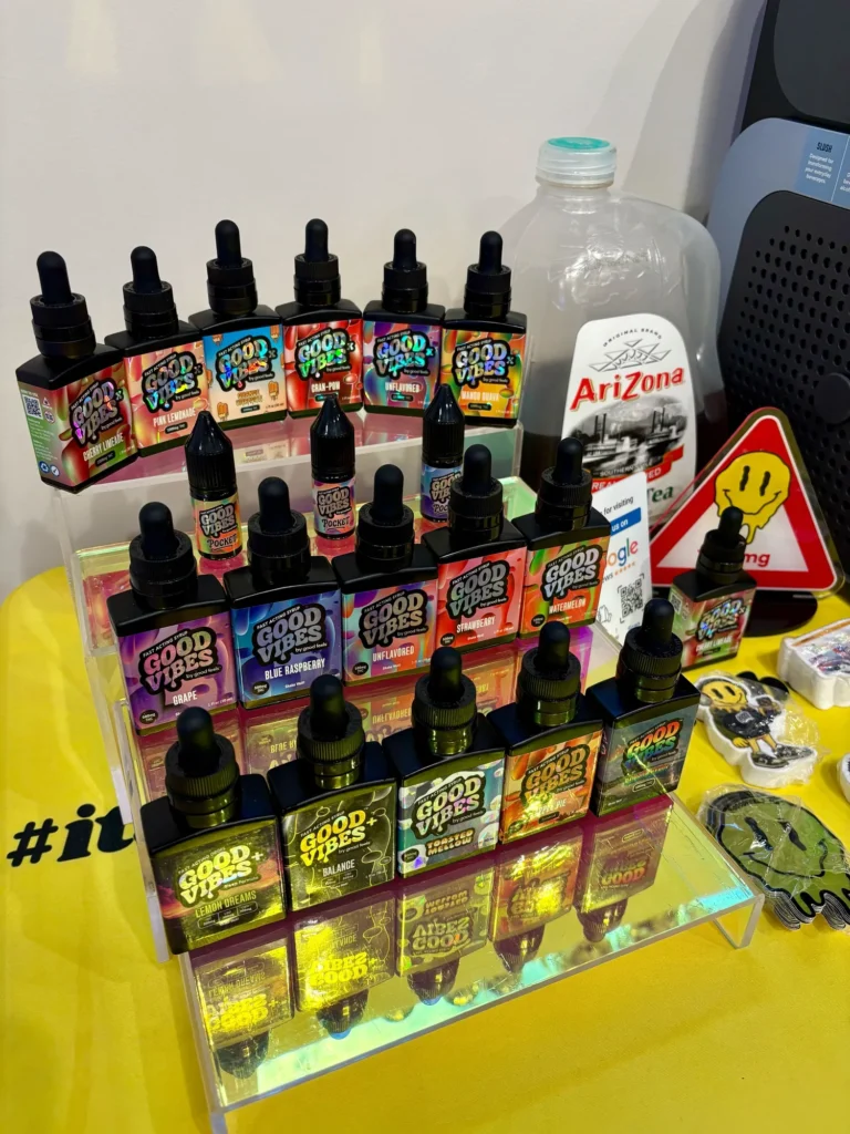 Good Vibes display with Blue Raspberry and Watermelon bottles at Quincy Cannabis.