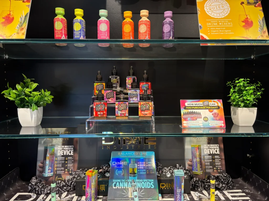 Bottles and colorful display cards at Ascend - Newton.