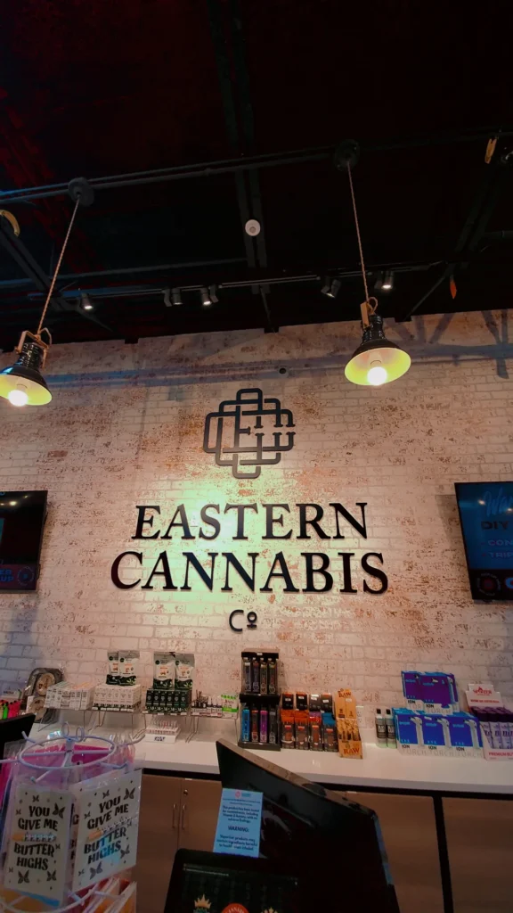 A retail sign anchoring the display at Eastern Cannabis Co - Malden.