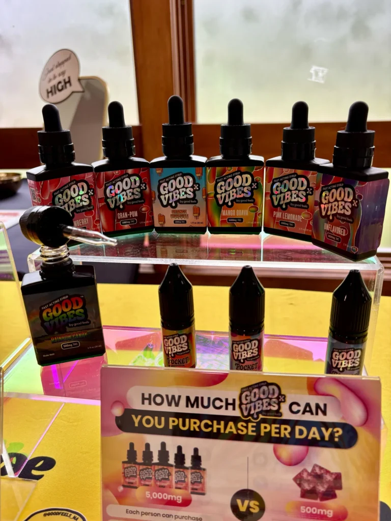 Good Vibes bottles and colorful display cards at Green Gold Group - Palmer.