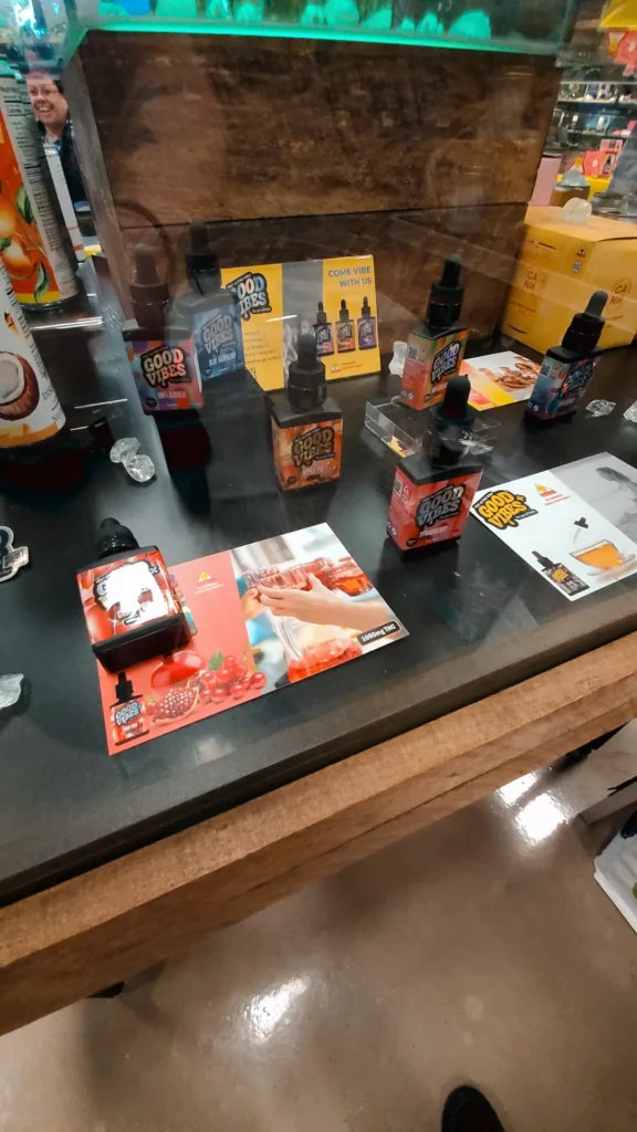 Good Vibes bottles and colorful display cards at Native Sun Wellness - North Attleboro.