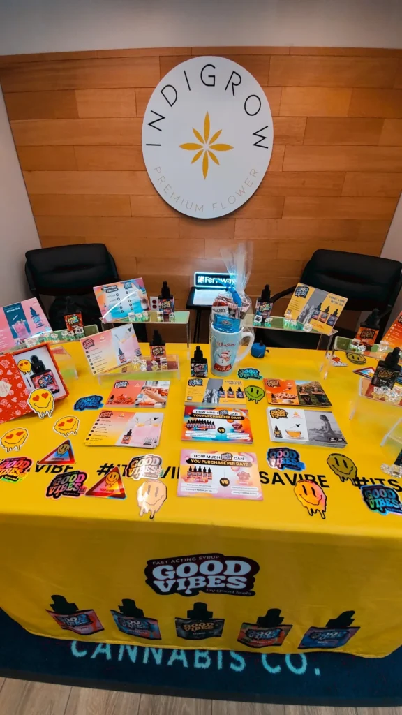 Good Vibes bottles and colorful display cards at Renew Cannabis Co (Berkley).