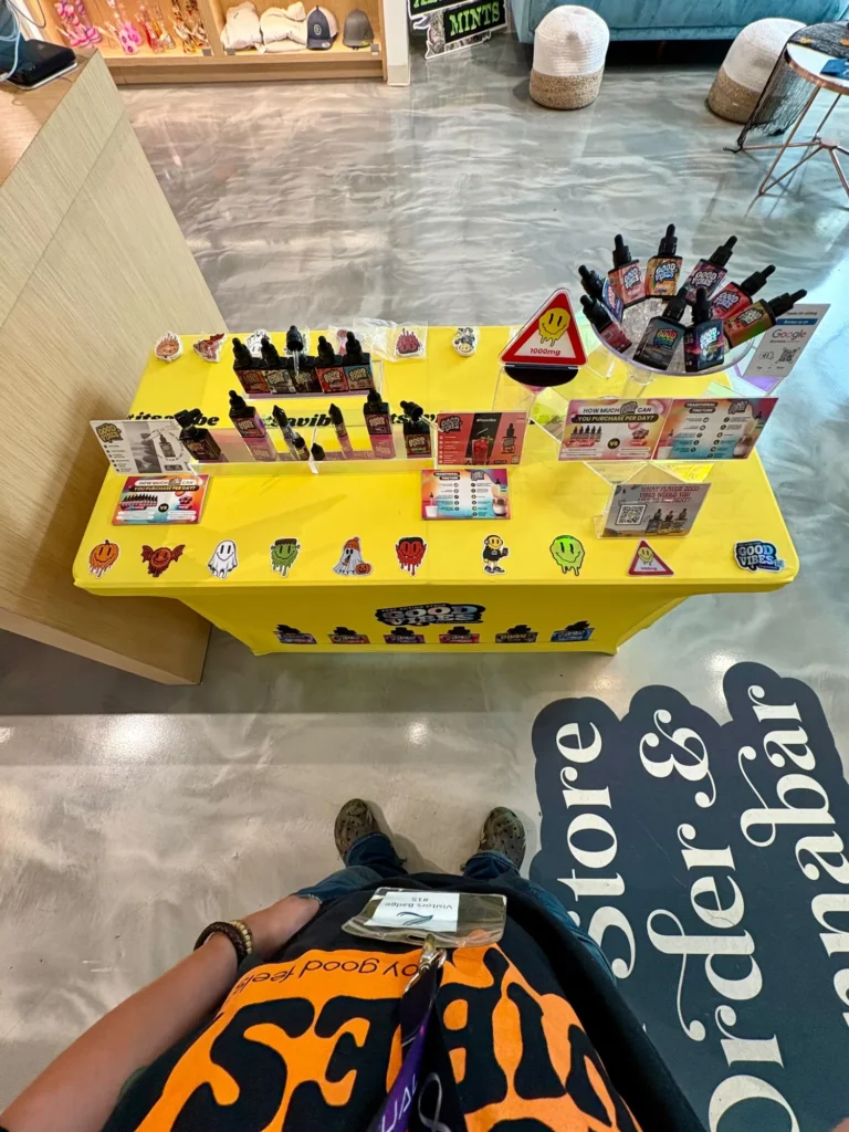 Zahara Cannabis – Attleboro interior with Good Vibes packaging and product information.