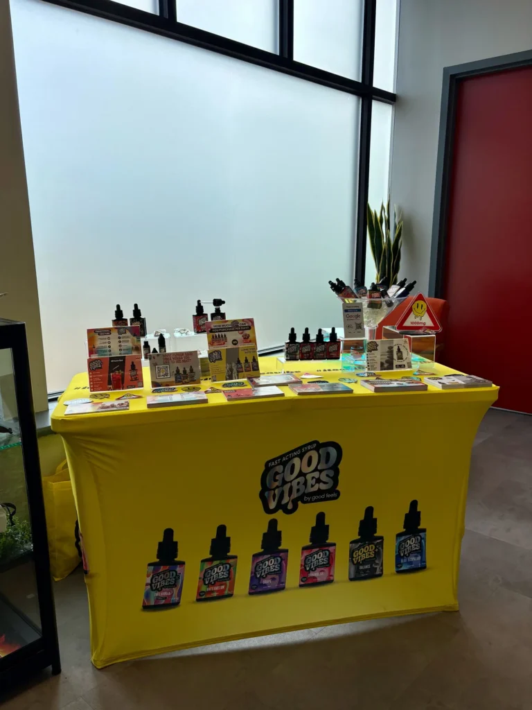Good Vibes bottles and colorful display cards at Fine Fettle - West Springfield.