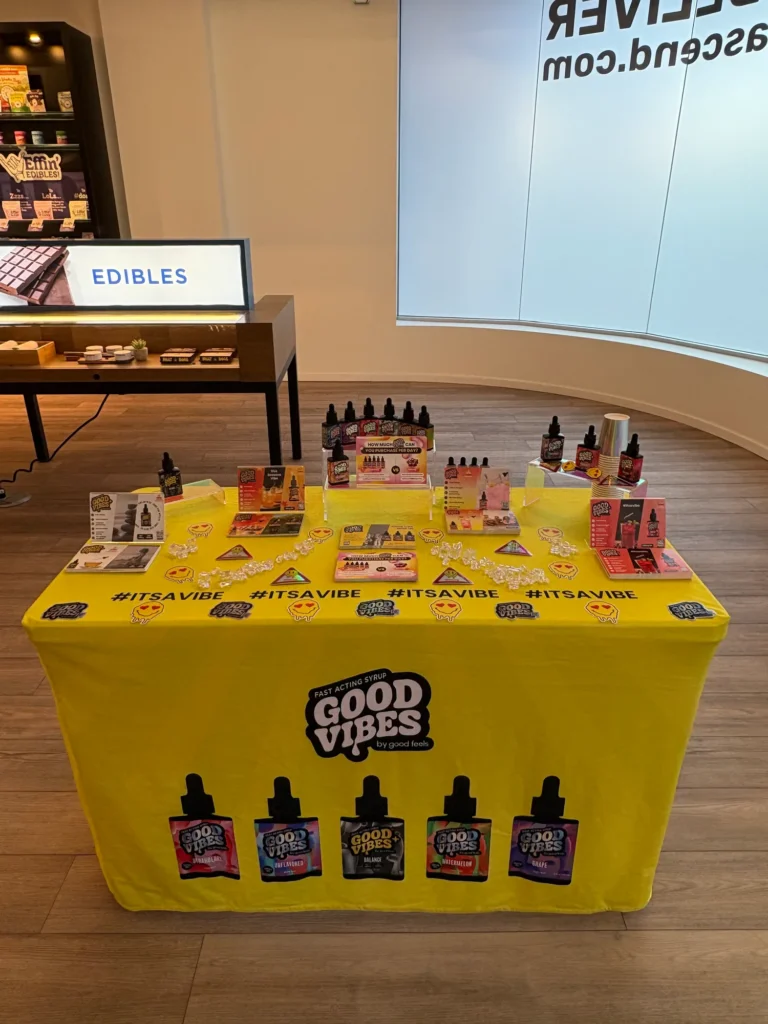 A Good Vibes sign anchoring the retail display at Ascend - Newton.