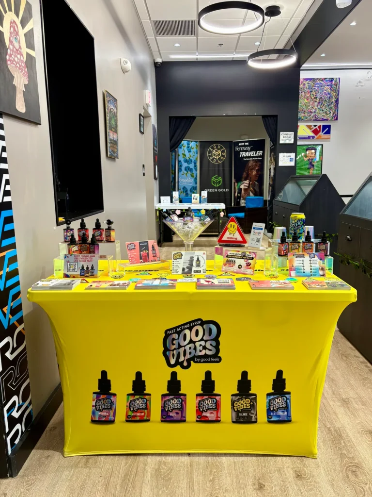 Good Vibes bottles and colorful display cards at New England Harvest - Clinton.