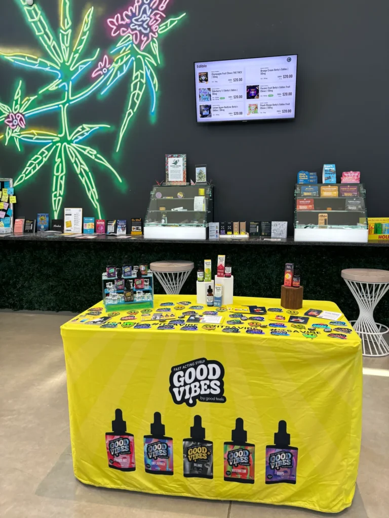 Playful retail display featuring fast-acting syrup and Balance at Collective Premium Cannabis – Billerica.
