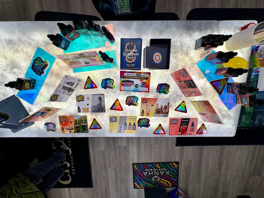 A Good Vibes display arranged across the retail counter at OMG Cannabis - Fitchburg.
