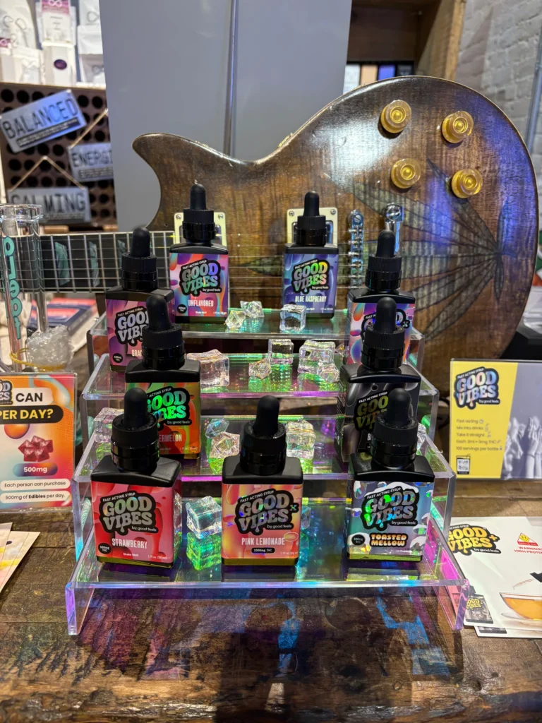 A Good Vibes sign anchoring the retail display at Canna Provisions - Holyoke.