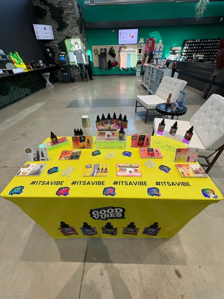 A Good Vibes sign anchoring the retail display at Collective Premium Cannabis - Billerica.