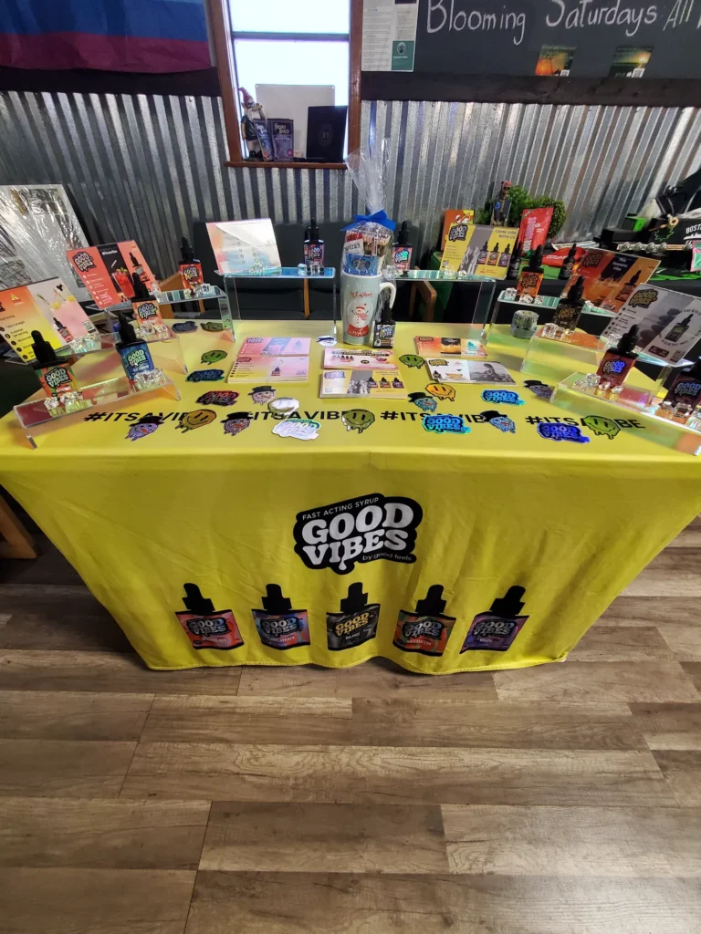 A Good Vibes sign anchoring the retail display at Boston Bud Factory - Holyoke.
